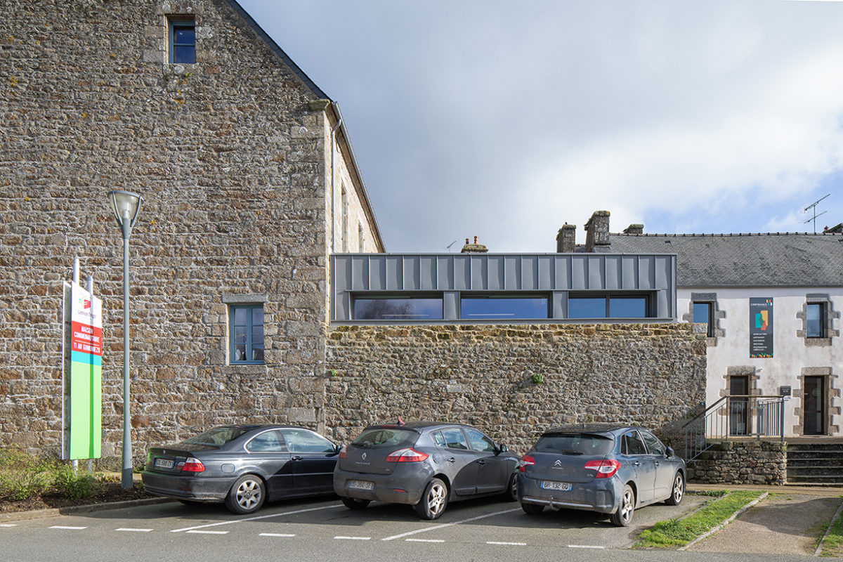 Parking bâtiment pierre zinc